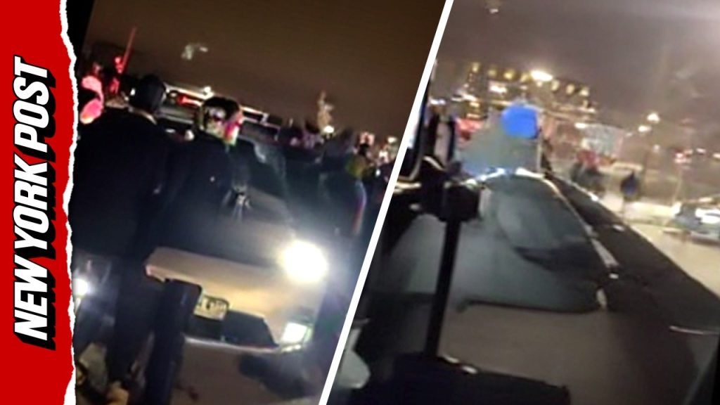 Protesters Surround and Bang on Vehicle with Federal Agents Inside
